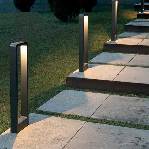 Pathway lights casting soft downward light onto a walkway