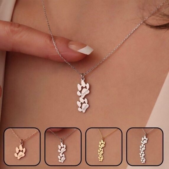 Personalized dog paw necklace with custom engraved pet names in gold, silver, and rose gold finishes.