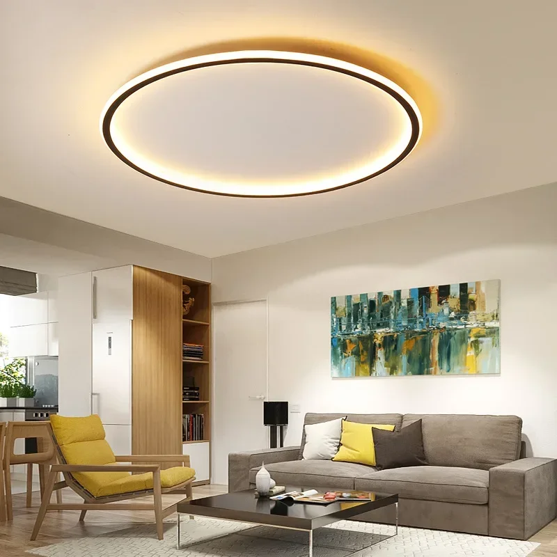 Round LED ceiling light in black, white and gold