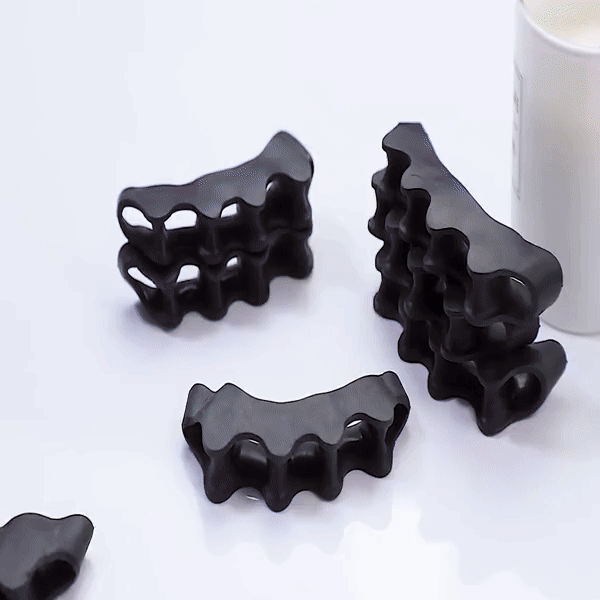 Clear silicone toe separators worn on bare feet