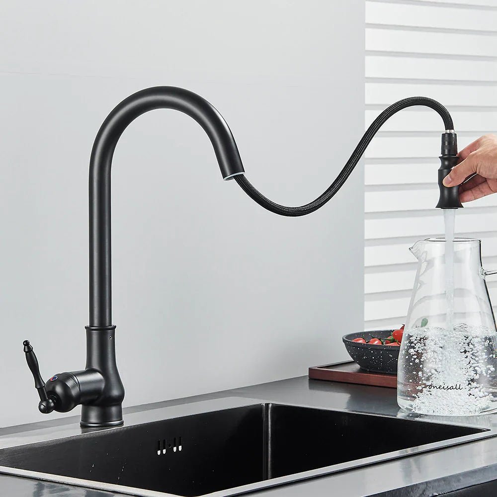 Spray head pulled out of the kitchen faucet filling a pot