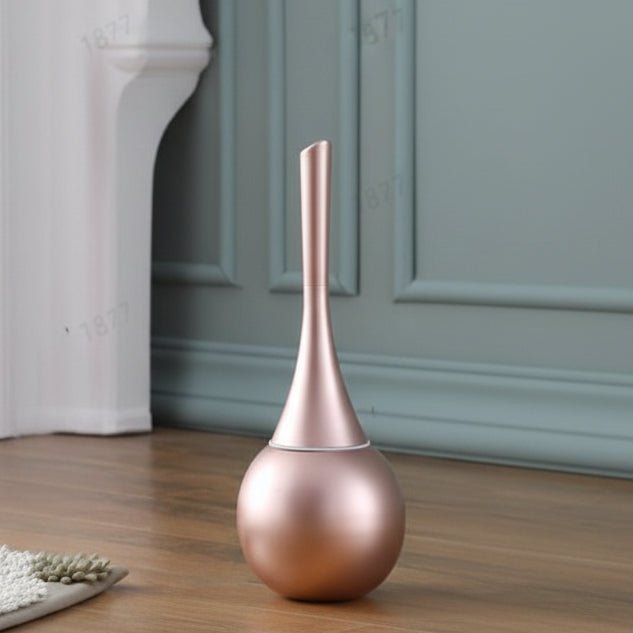 Silicone toilet brush with flexible head in a ventilated holder