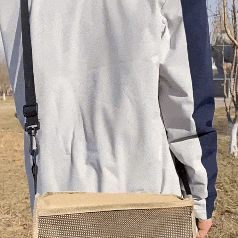 Folding chair backpack opened up as a seat outdoors