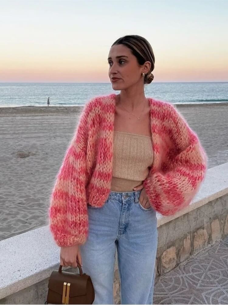 Front view of a two-tone cropped knit sweater