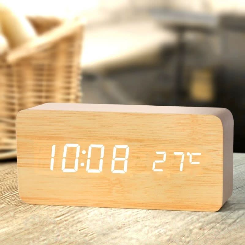 Wood look alarm clock in triangle and bar shaped versions